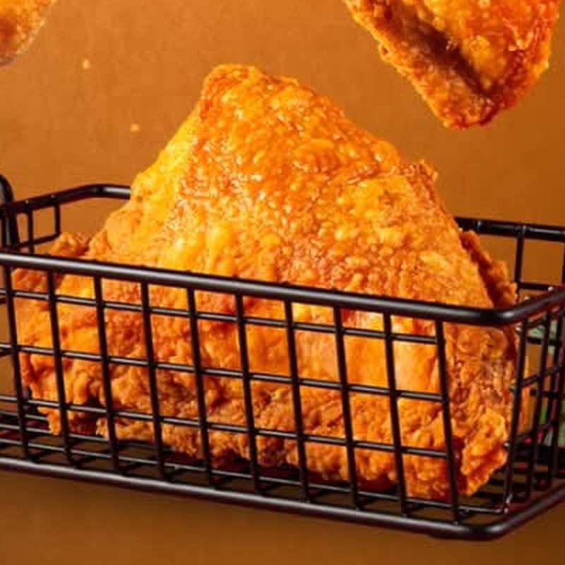 Best broast in Lahore served in a basket with fries at Dajaj Broast